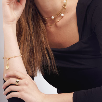 UNOAERRE Bracciale in bronzo dorato e perle naturali